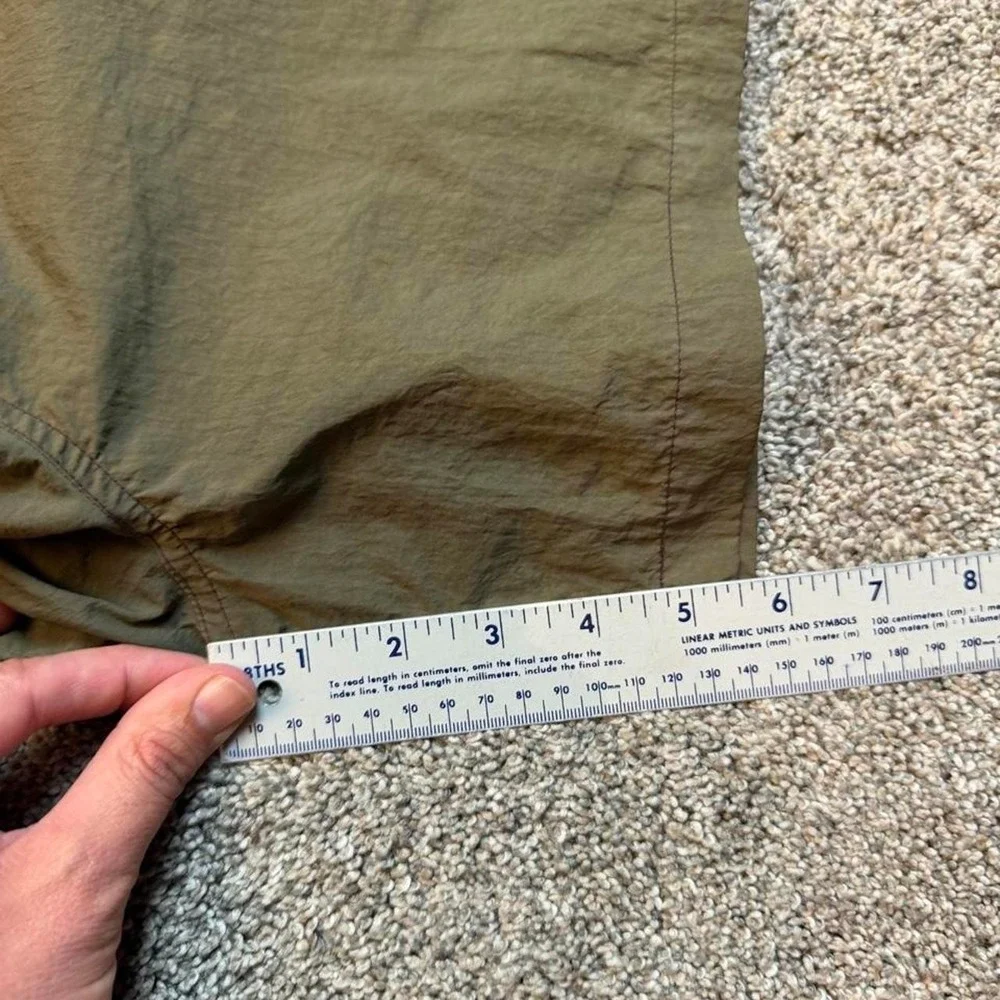 Vintage Nike white tag olive green windbreaker shorts size medium 5 in inseam